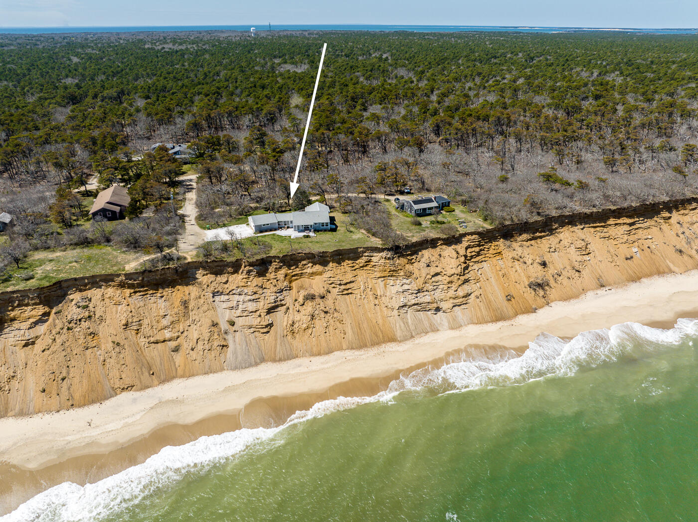 157 Brownell Road Eastham, MA 02642 - Photo 5 of 45 a view of a yard with an ocean