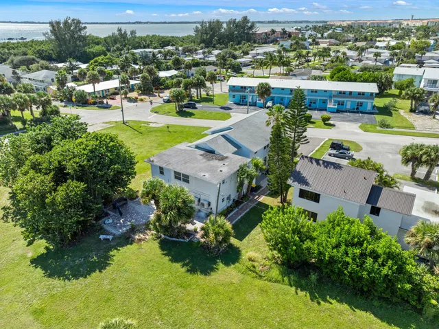 an aerial view of a house with a garden view