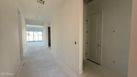 a view of hallway with windows