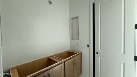 an empty room with a bathroom