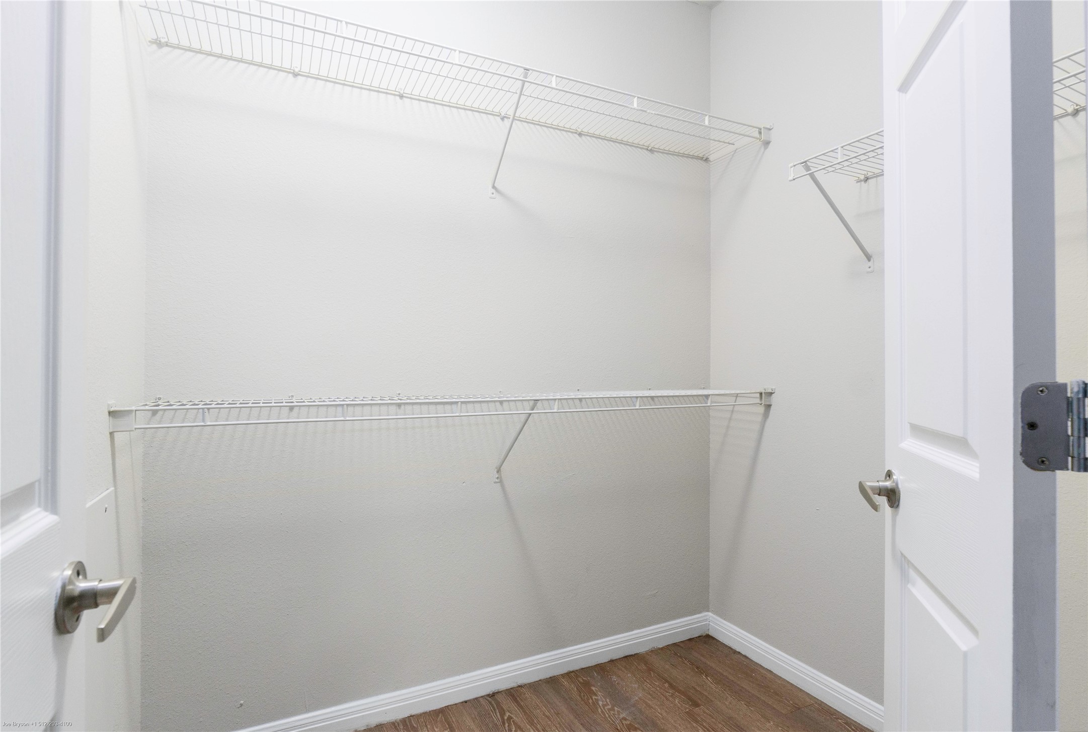 2502 Leon Street, Unit 305 Austin, TX 78705 - Photo 16 of 26 Walk-in closet primary bedroom