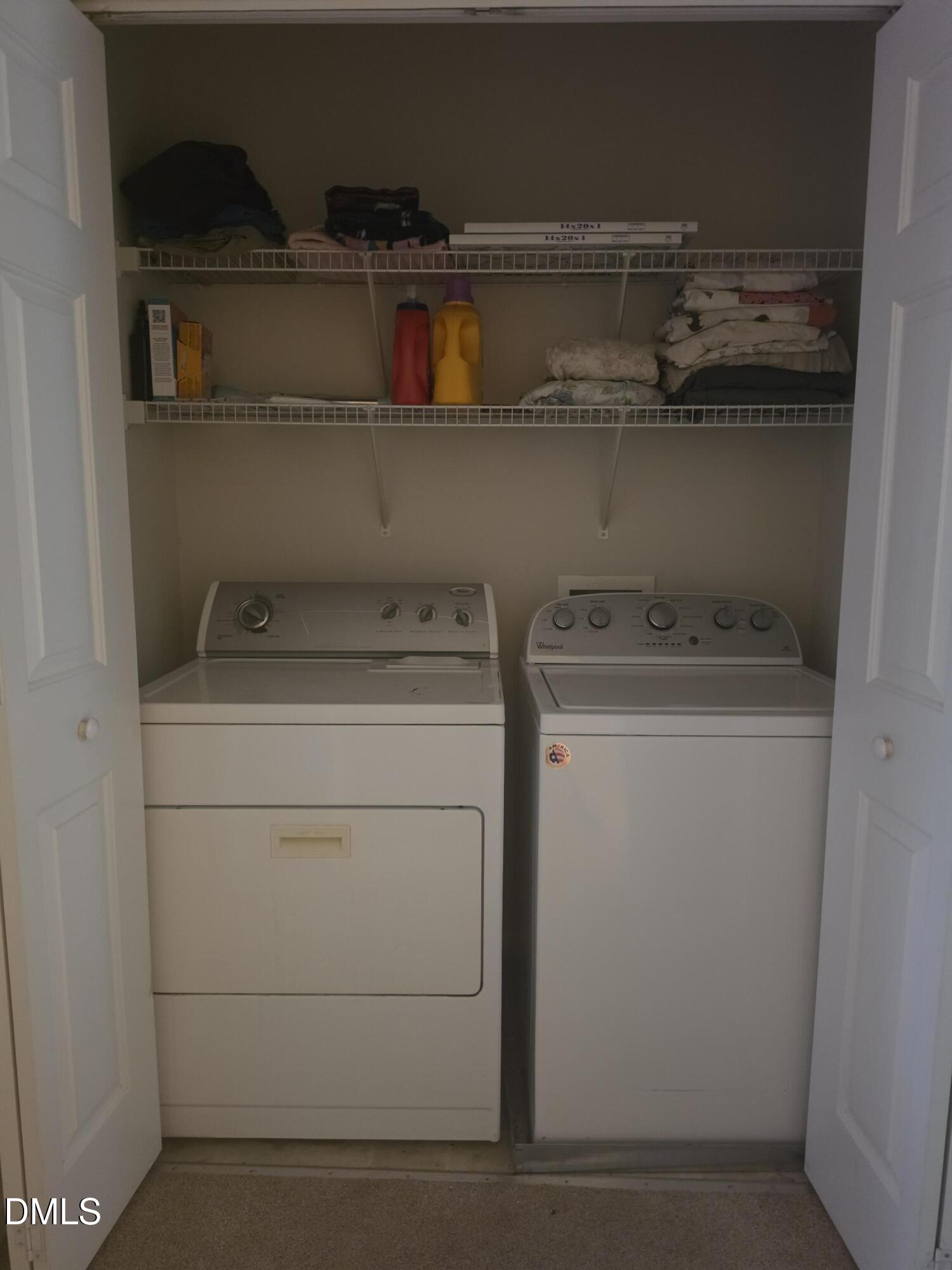 2405 Trout Stream Drive Raleigh, NC 27604 - Photo 6 of 13 a utility room with dryer and washer