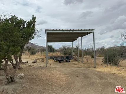 a view of a back yard of the house