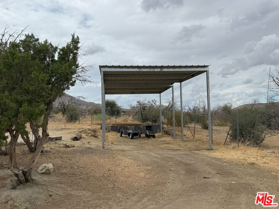 29243 Piani Road Pearblossom, CA 93553 - Photo 36 of 64 a view of a terrace with a yard