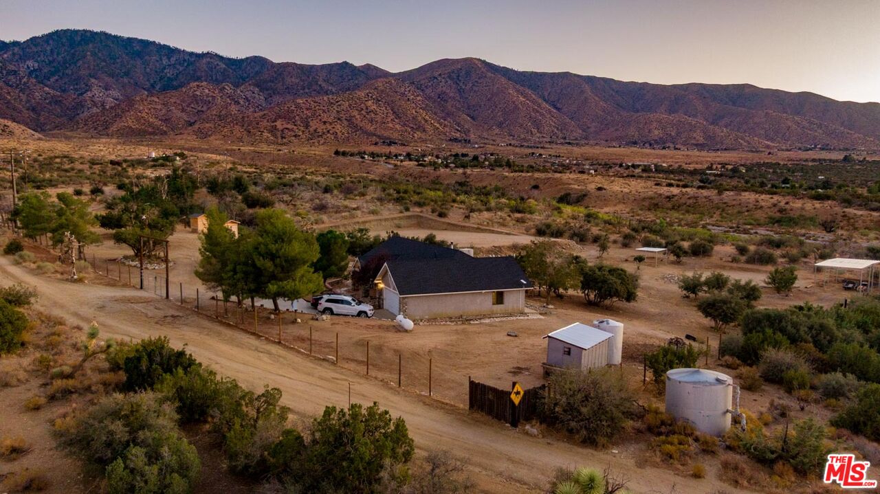 29243 Piani Road Pearblossom, CA 93553 - Photo 44 of 64 a view of a town with mountains in the background