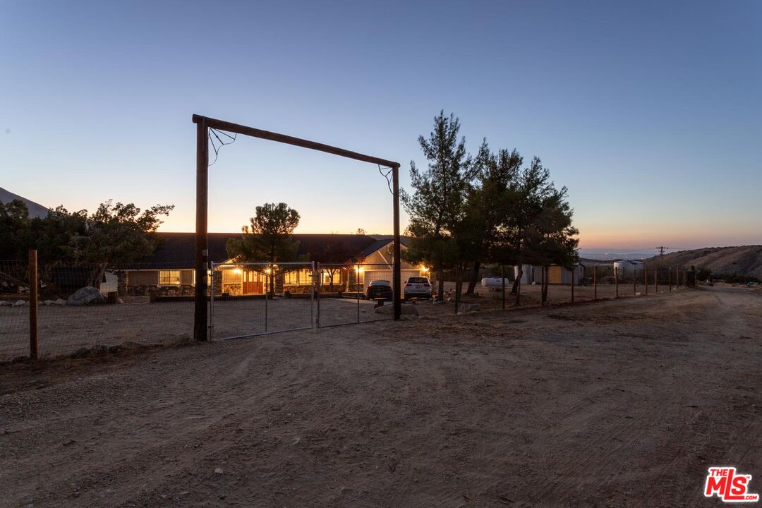 29243 Piani Road Pearblossom, CA 93553 - Photo 64 of 64 a view of a yard with a tree