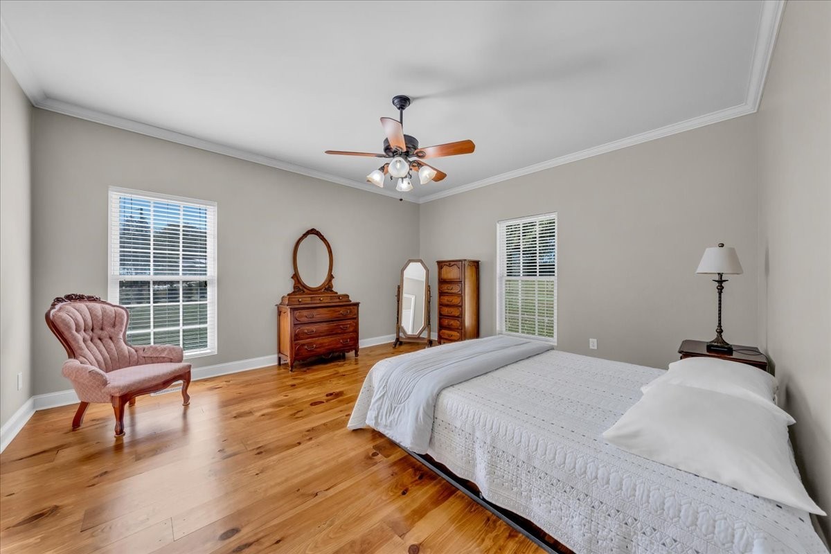 131 Butterfly Lane Bell Buckle, TN 37020 - Photo 20 of 46 a bedroom with a bed chair and a window