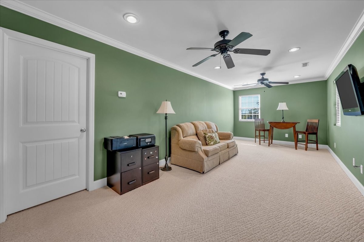 131 Butterfly Lane Bell Buckle, TN 37020 - Photo 26 of 46 a living room with furniture and a ceiling fan
