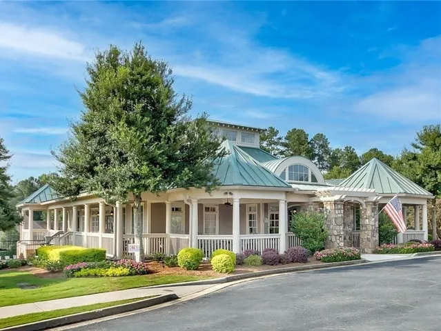 an aerial view of a house with outdoor space