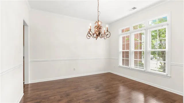 a view of a room with a large window