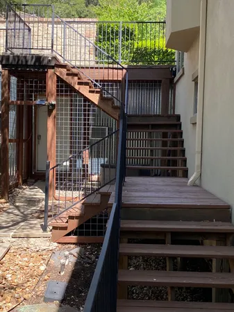 a view of a balcony with a swing