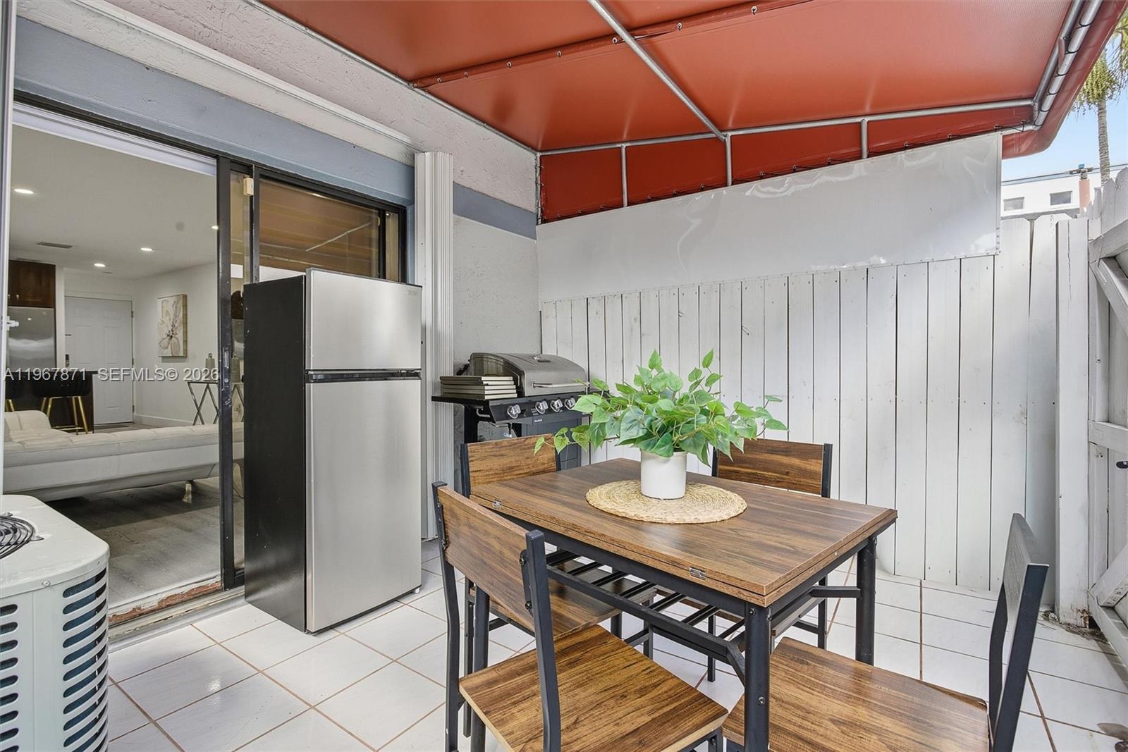 11781 Southwest 18th Street, Unit 640 Miami, FL 33175 - Photo 22 of 32 a dining room with furniture and window