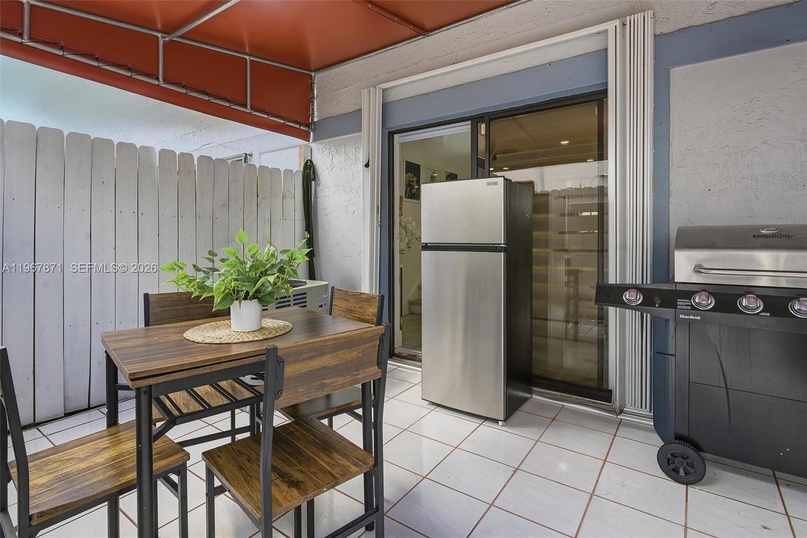 11781 Southwest 18th Street, Unit 640 Miami, FL 33175 - Photo 23 of 32 a dining room with furniture