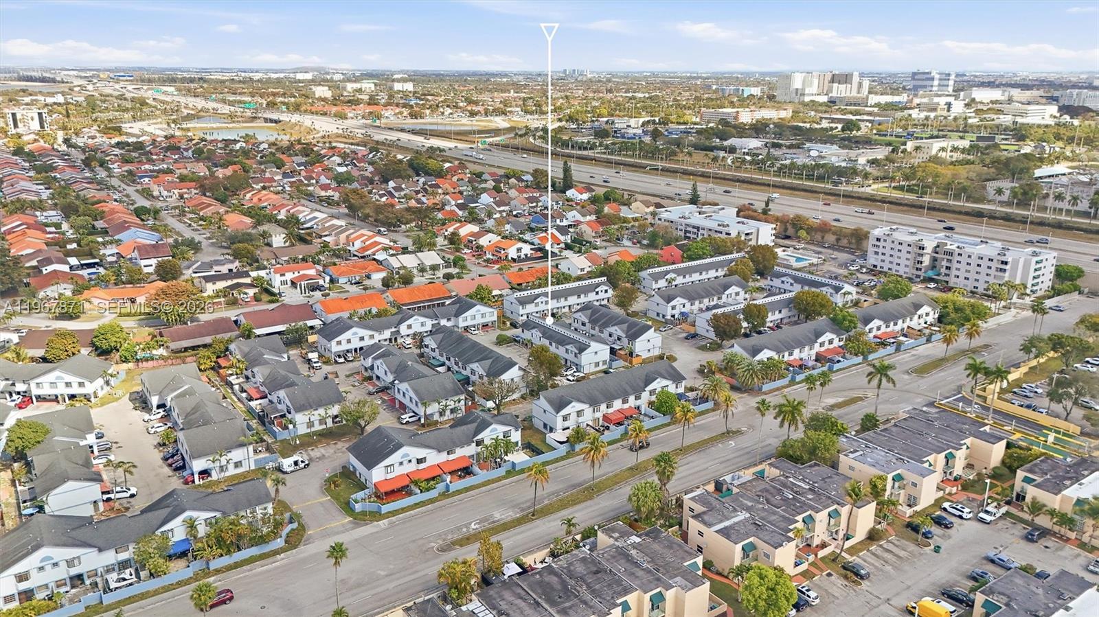 11781 Southwest 18th Street, Unit 640 Miami, FL 33175 - Photo 31 of 32 an aerial view of residential building and lake