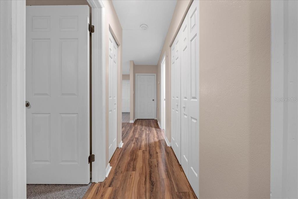 3702 Northeast 17th Street Ocala, FL 34470 - Photo 30 of 70 a view of a hallway with wooden floor and entryway