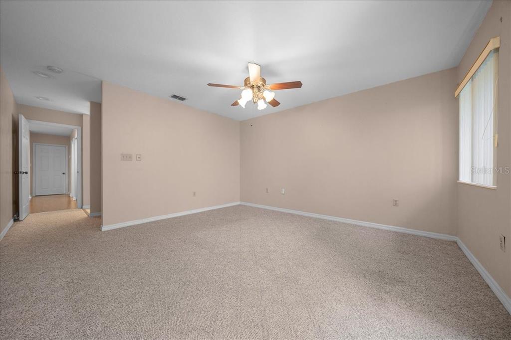 3702 Northeast 17th Street Ocala, FL 34470 - Photo 30 of 63 a view of an empty room with a window