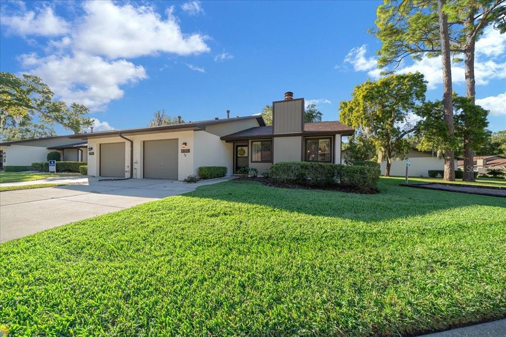 3702 Northeast 17th Street Ocala, FL 34470 - Photo 40 of 63 a view of a house with backyard and garden