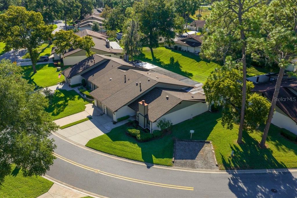 3702 Northeast 17th Street Ocala, FL 34470 - Photo 60 of 63 an aerial view of a house with a garden