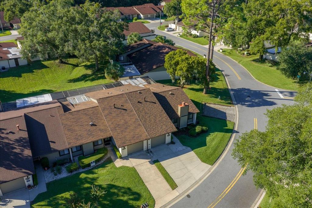 3702 Northeast 17th Street Ocala, FL 34470 - Photo 68 of 70 an aerial view of a house with a garden and trees