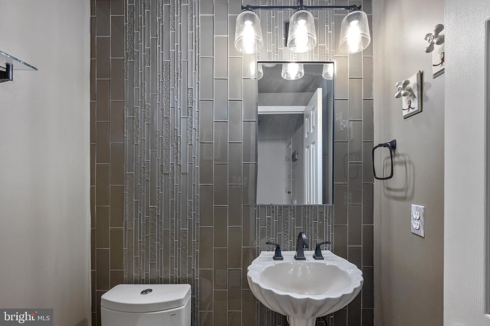 16010 Edgewood Drive Dumfries, VA 22025 - Photo 35 of 85 Updated half bath off the kitchen