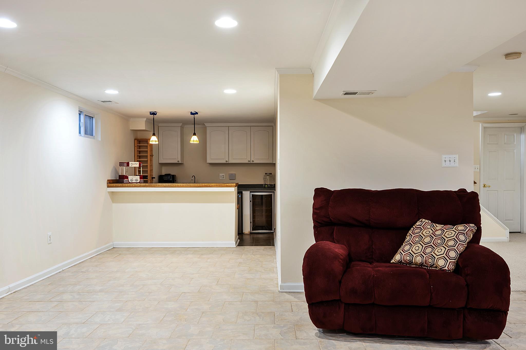 16010 Edgewood Drive Dumfries, VA 22025 - Photo 60 of 85 Wet bar in the basement for entertaining guests.