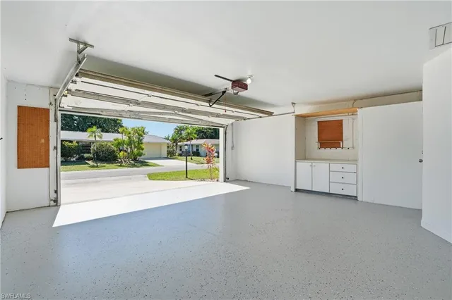 a view of a livingroom with an empty space and a porch