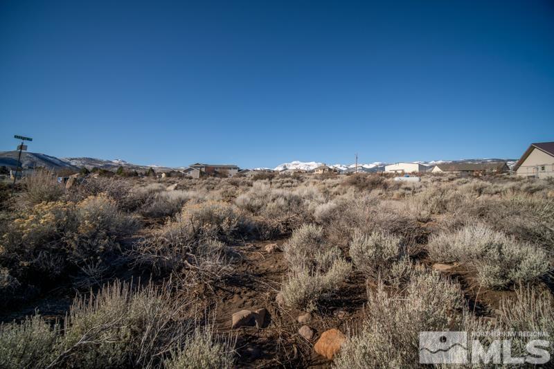 0 Spezia Road Reno, NV 89511 - Photo 17 of 17 a view of a lake with a mountain in the background