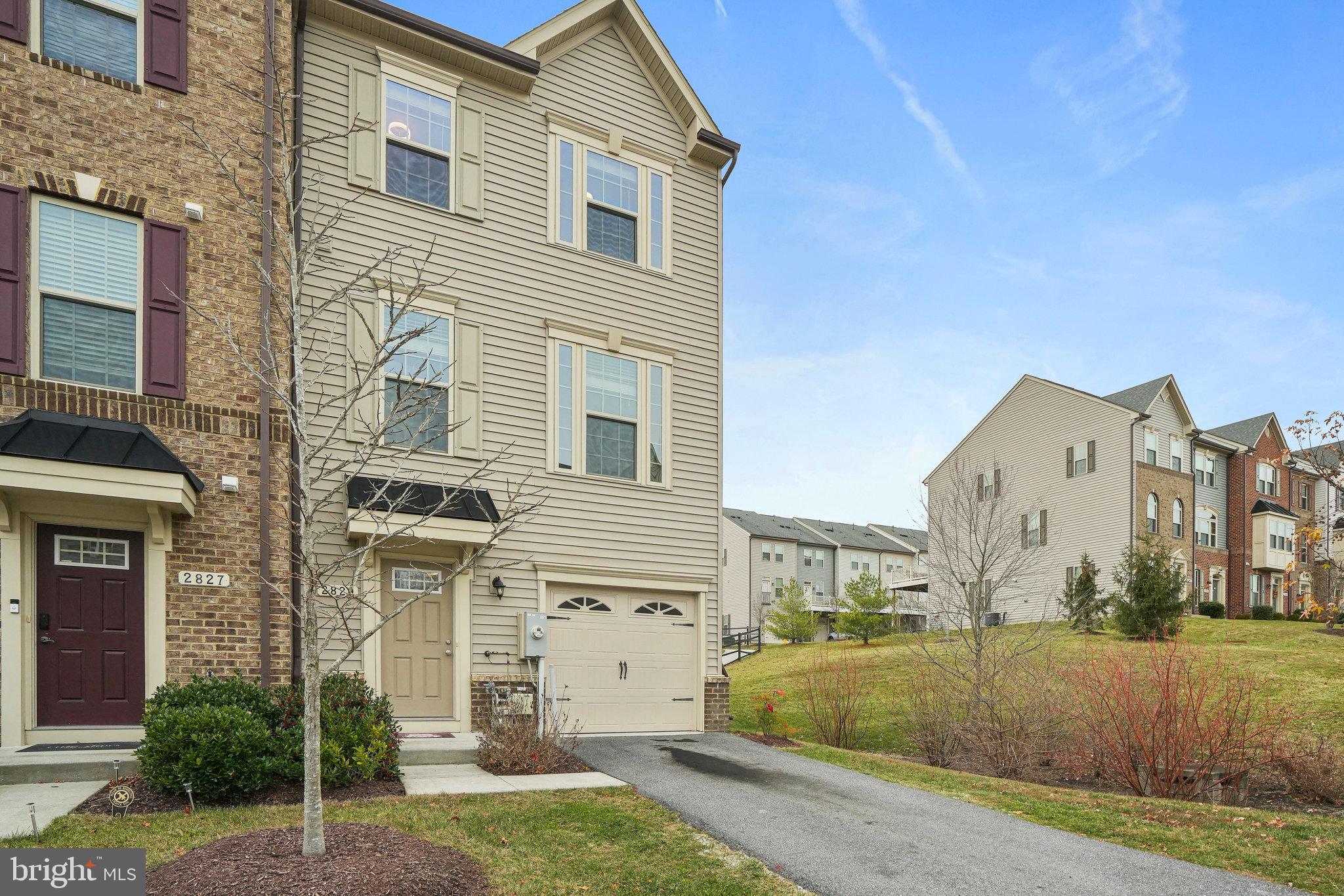 2829 Fredericksburg Road Hanover, MD 21076 - Photo 2 of 37 a view of a house with a yard