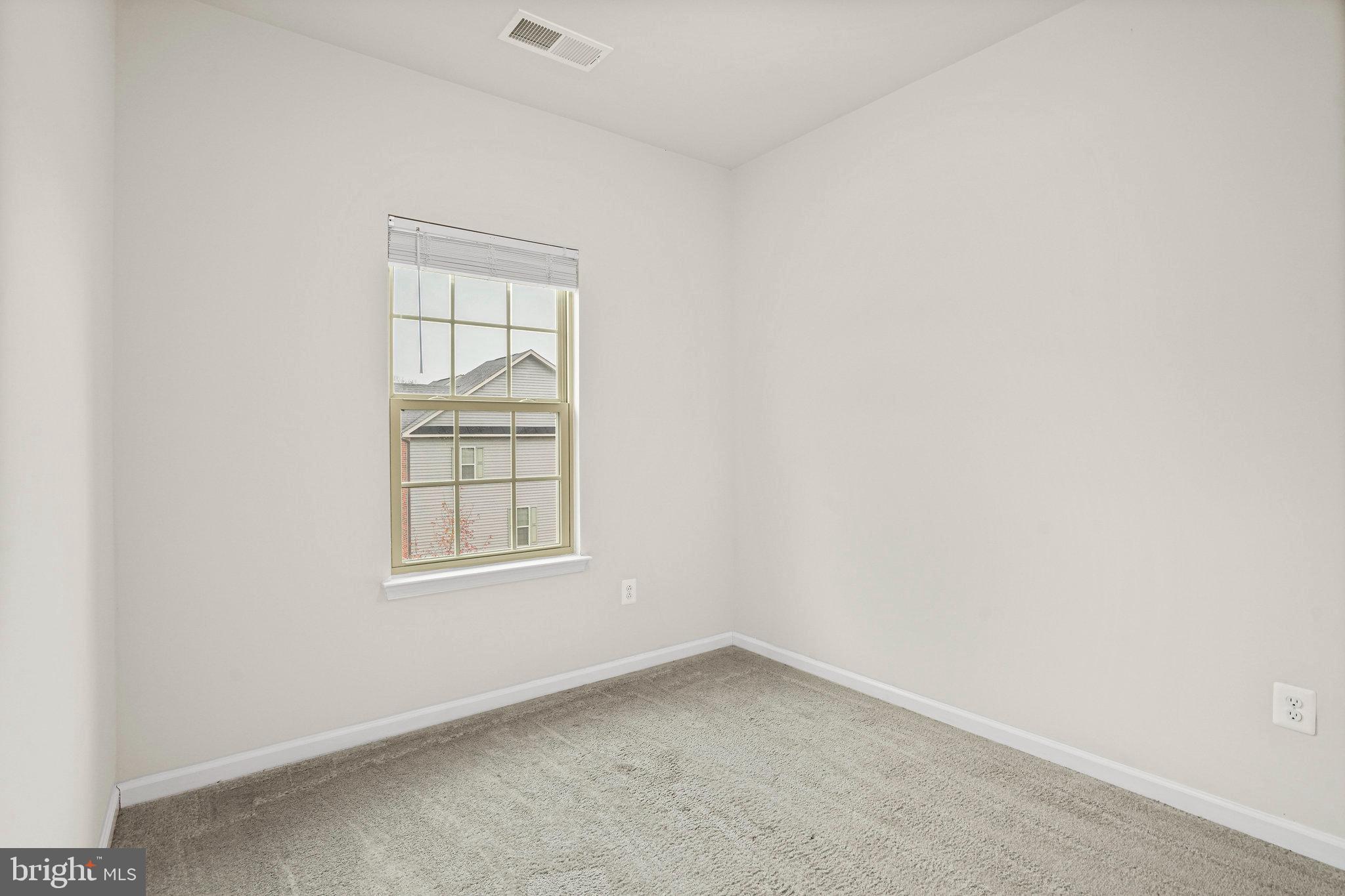 2829 Fredericksburg Road Hanover, MD 21076 - Photo 22 of 37 an empty room with a window