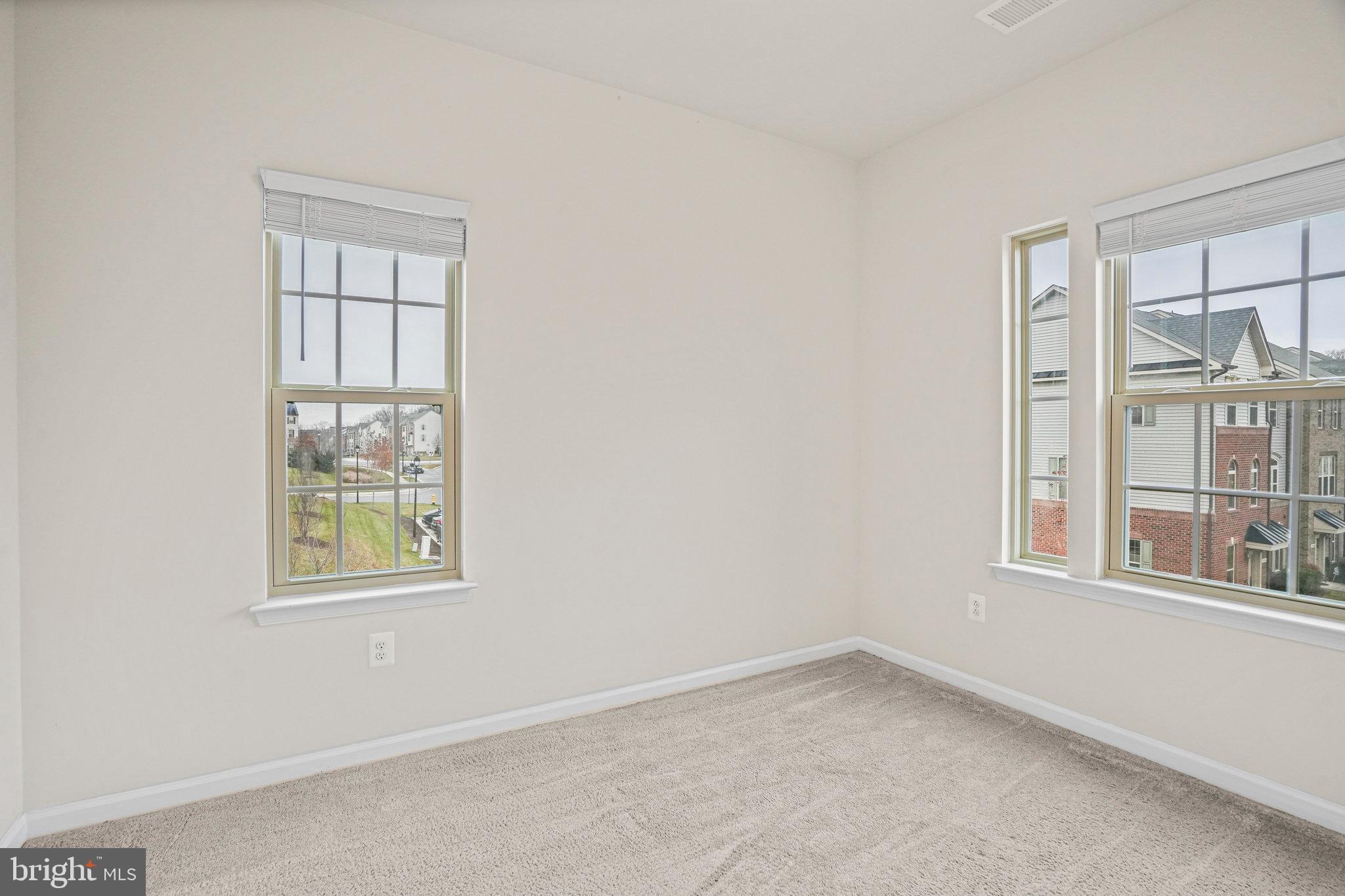 2829 Fredericksburg Road Hanover, MD 21076 - Photo 23 of 37 an empty room with windows