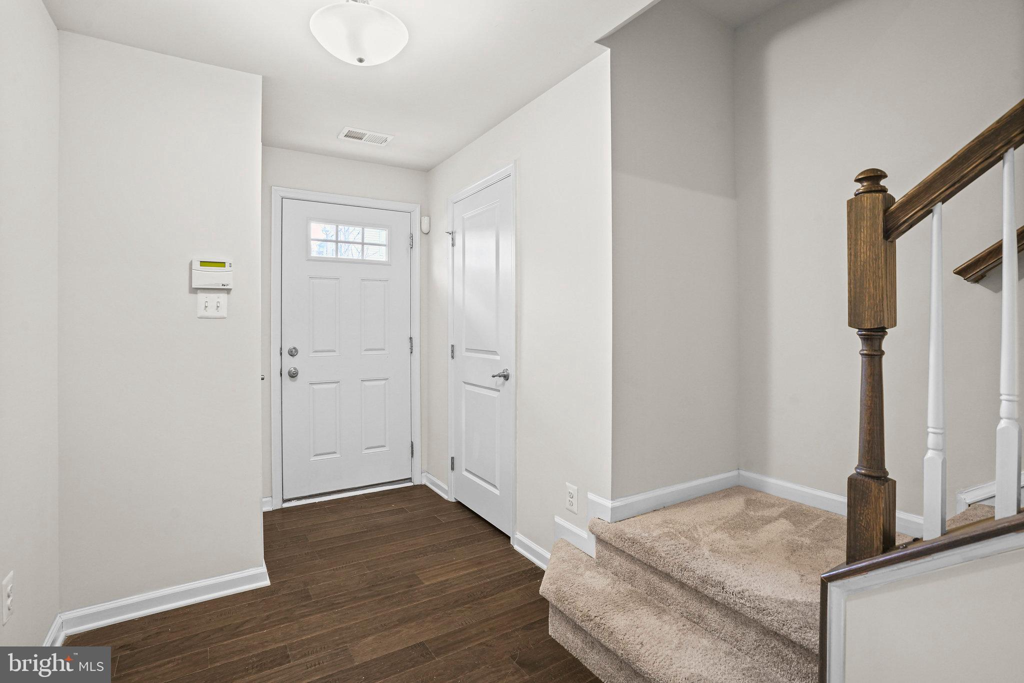 2829 Fredericksburg Road Hanover, MD 21076 - Photo 28 of 37 a view of entryway with wooden floor