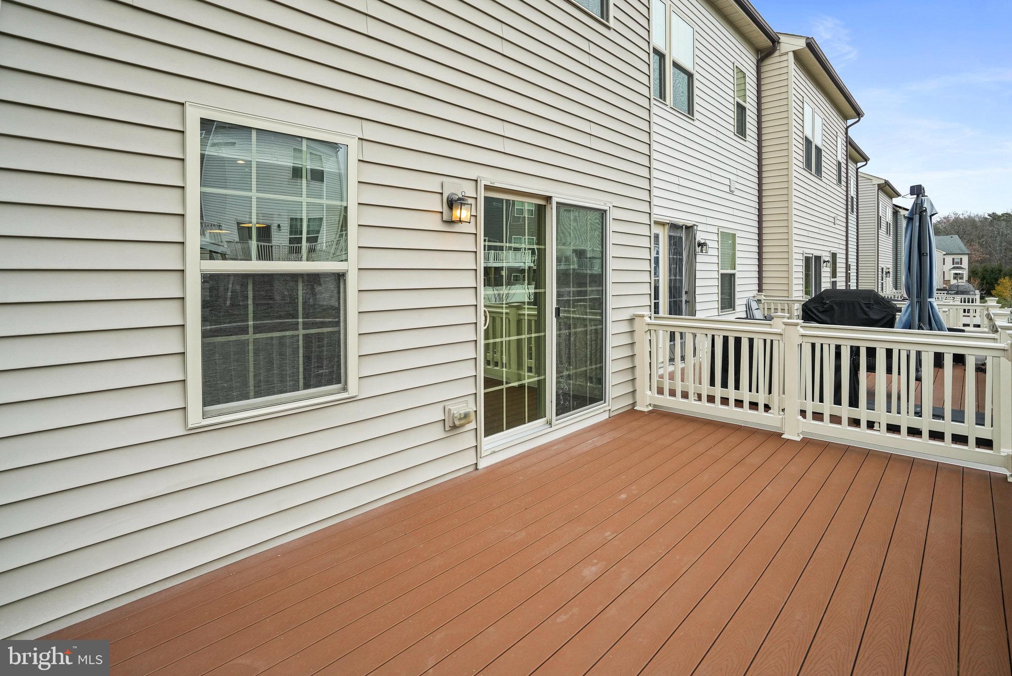 2829 Fredericksburg Road Hanover, MD 21076 - Photo 31 of 37 a view of a house with deck and wooden floor