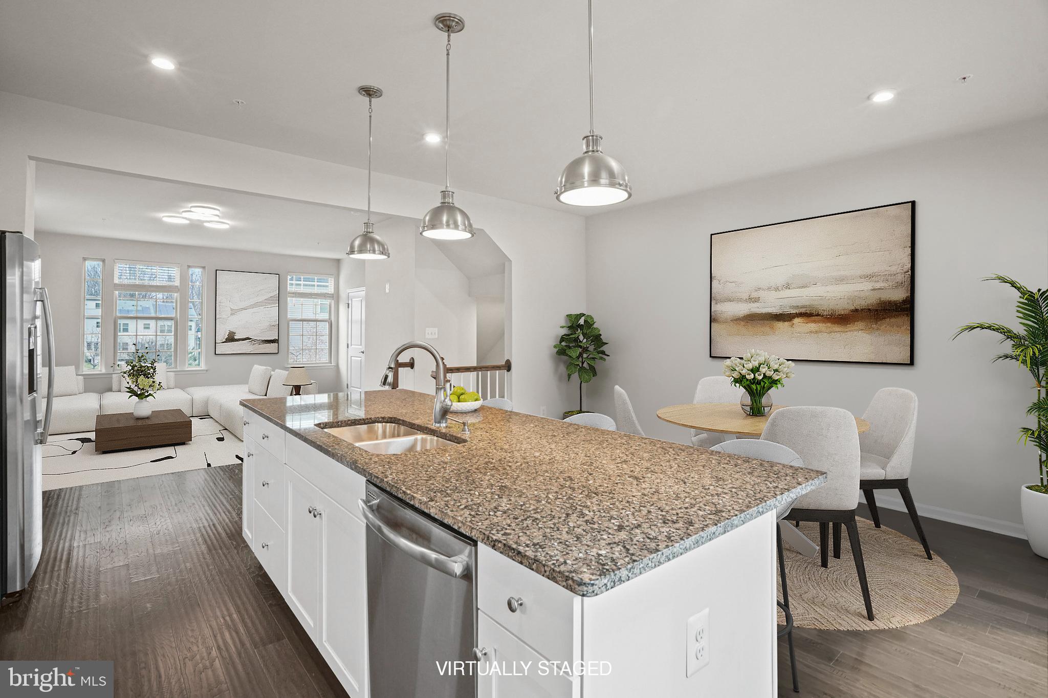 2829 Fredericksburg Road Hanover, MD 21076 - Photo 8 of 37 a kitchen with center island and living room