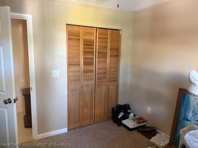 5330 Lakewood Road Sebring, FL 33875 - Photo 14 of 19 a room with furniture and a window