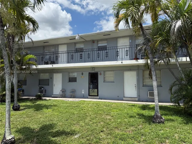 a house view with a garden space