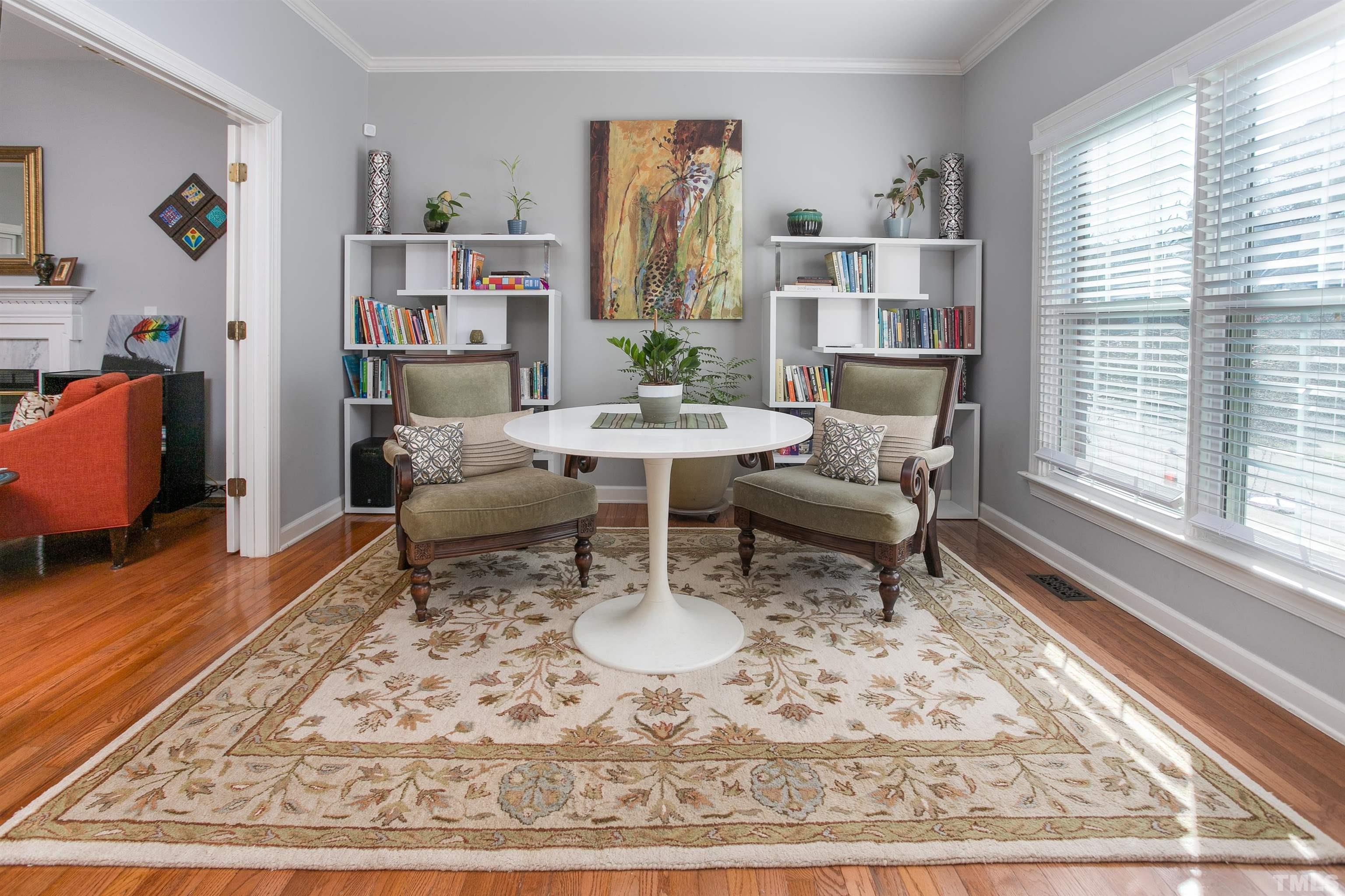 8832 Braceridge Road Raleigh, NC 27613 - Photo 8 of 40 a living room with furniture and a rug