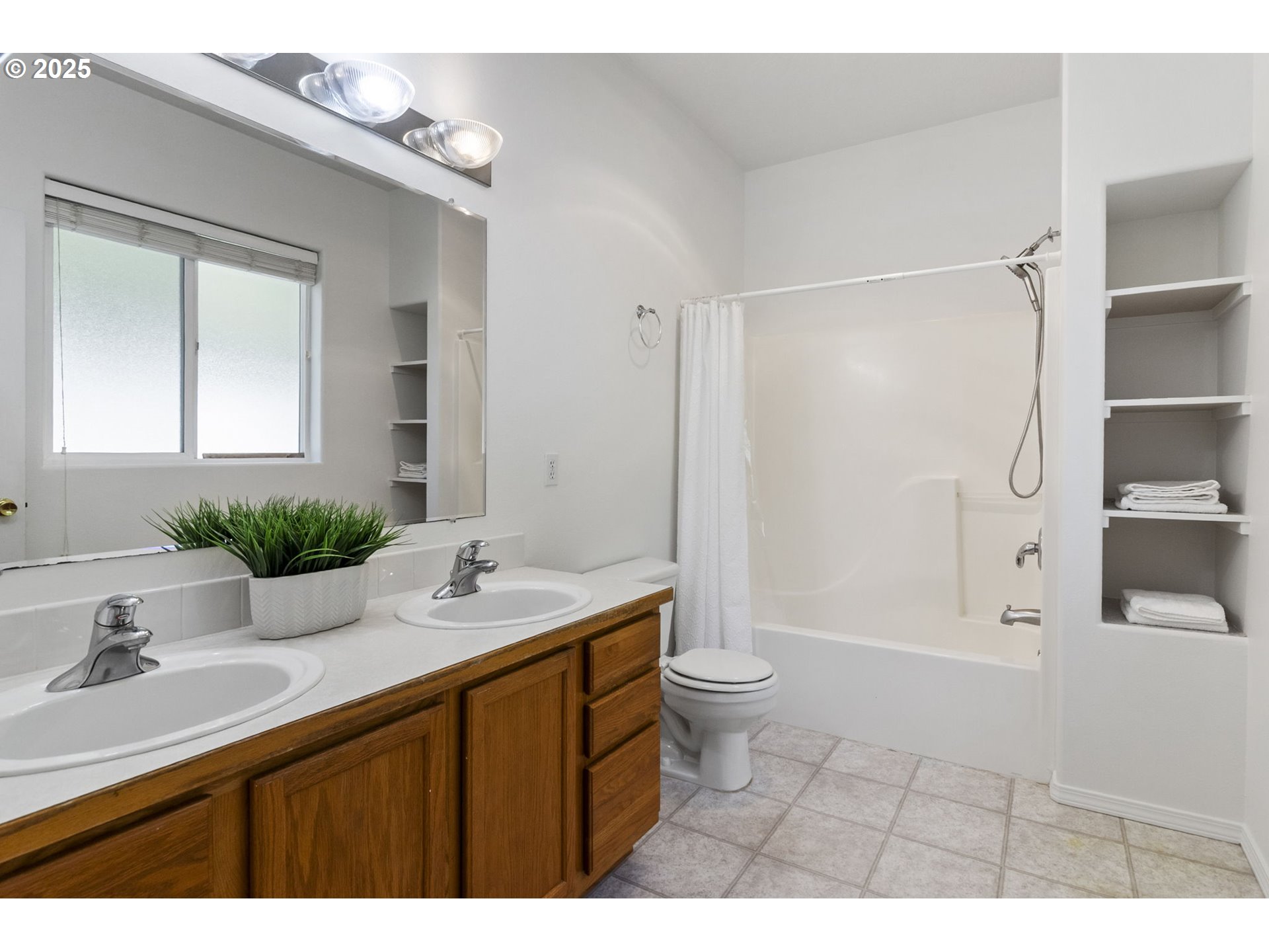 2175 Kelsey Lane Eugene, OR 97402 - Photo 13 of 27 a bathroom with a sink a toilet and shower