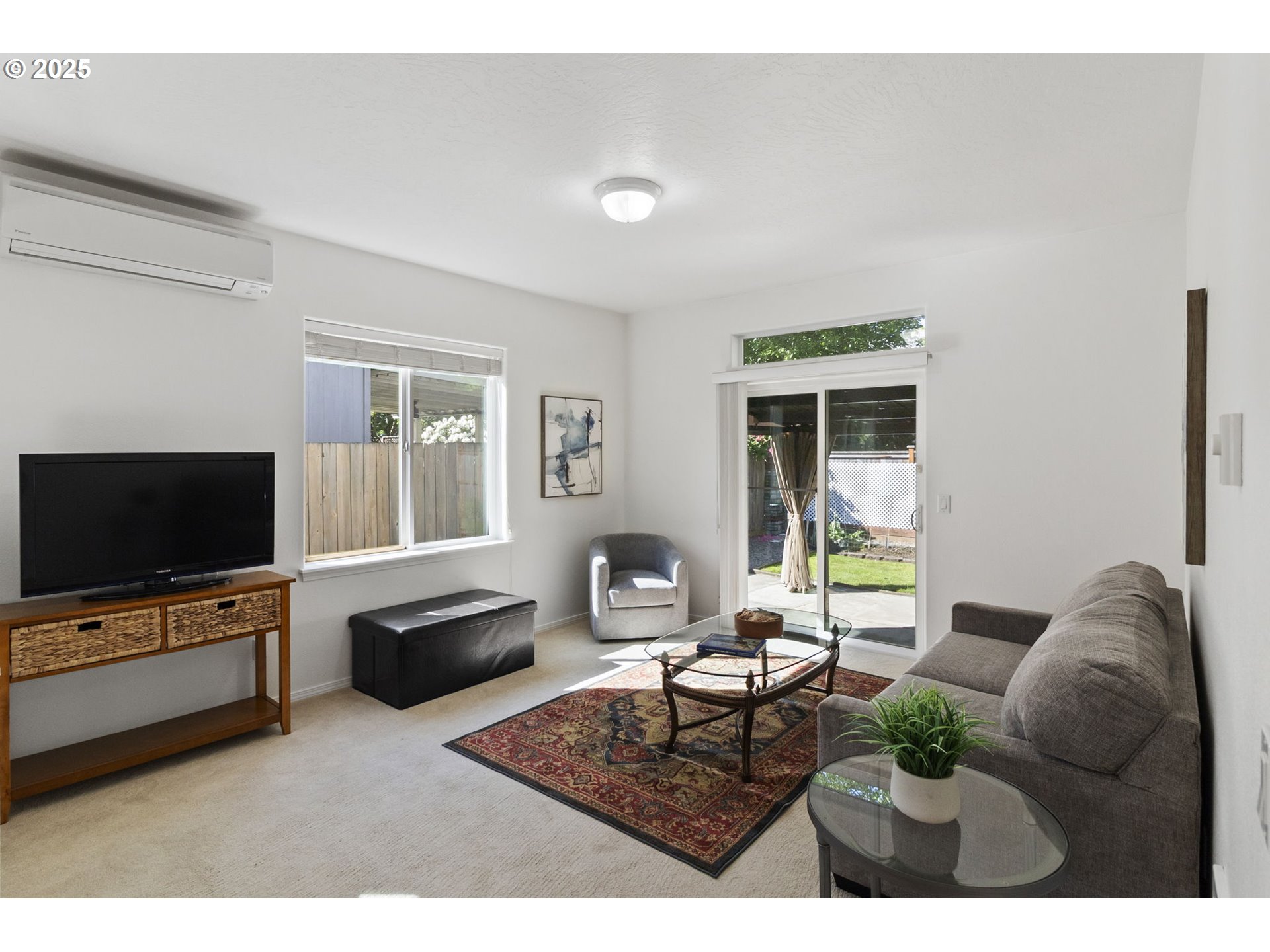 2175 Kelsey Lane Eugene, OR 97402 - Photo 3 of 27 a living room with furniture and a flat screen tv