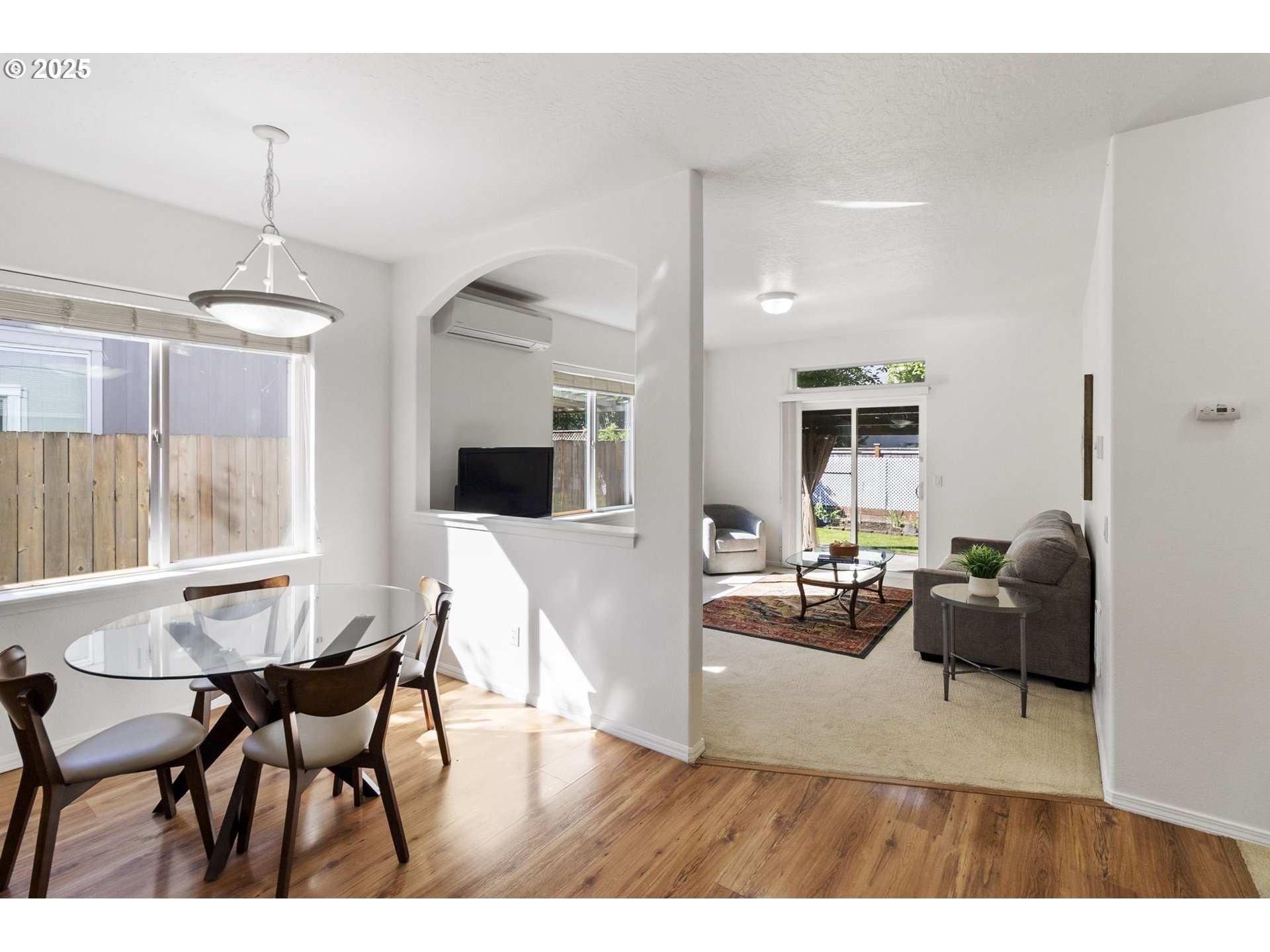 2175 Kelsey Lane Eugene, OR 97402 - Photo 6 of 27 a view of a dining room with furniture and wooden floor