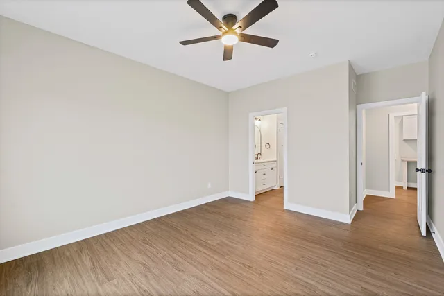 a bathroom with a glass shower door