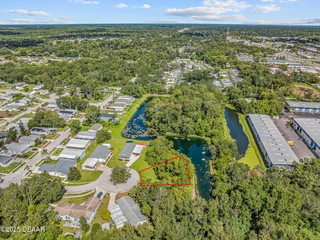 a view of a yard with an outdoor seating