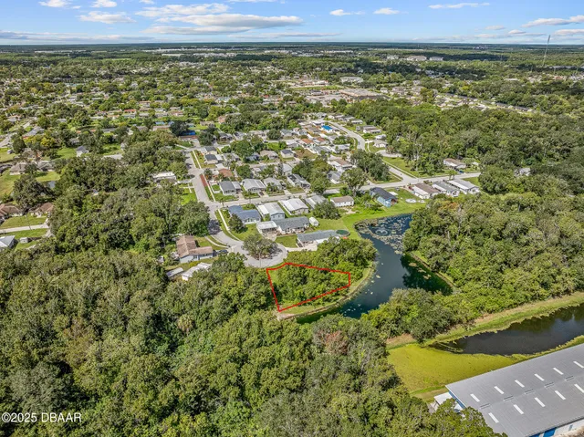 a view of a field with an outdoor space