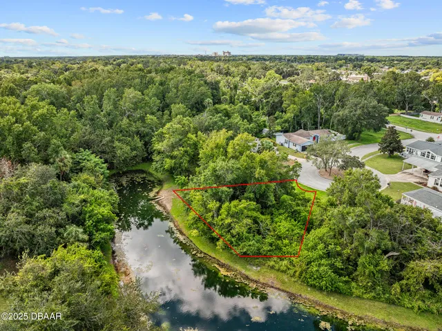 a view of a garden with an outdoor space