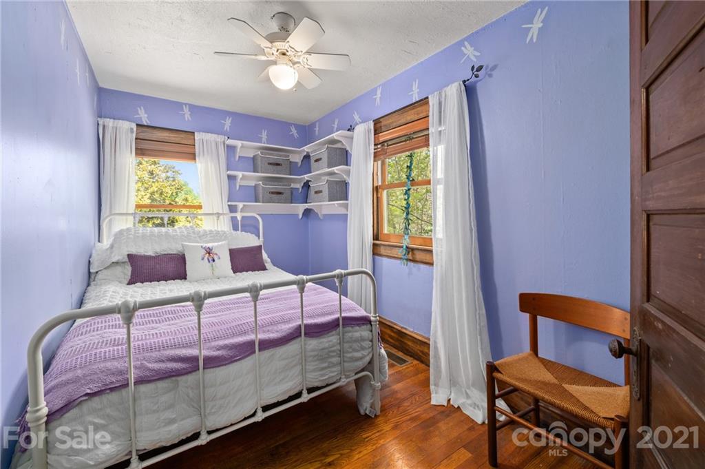 56 Pearson Drive Asheville, NC 28801 - Photo 20 of 44 a living room with furniture and a window