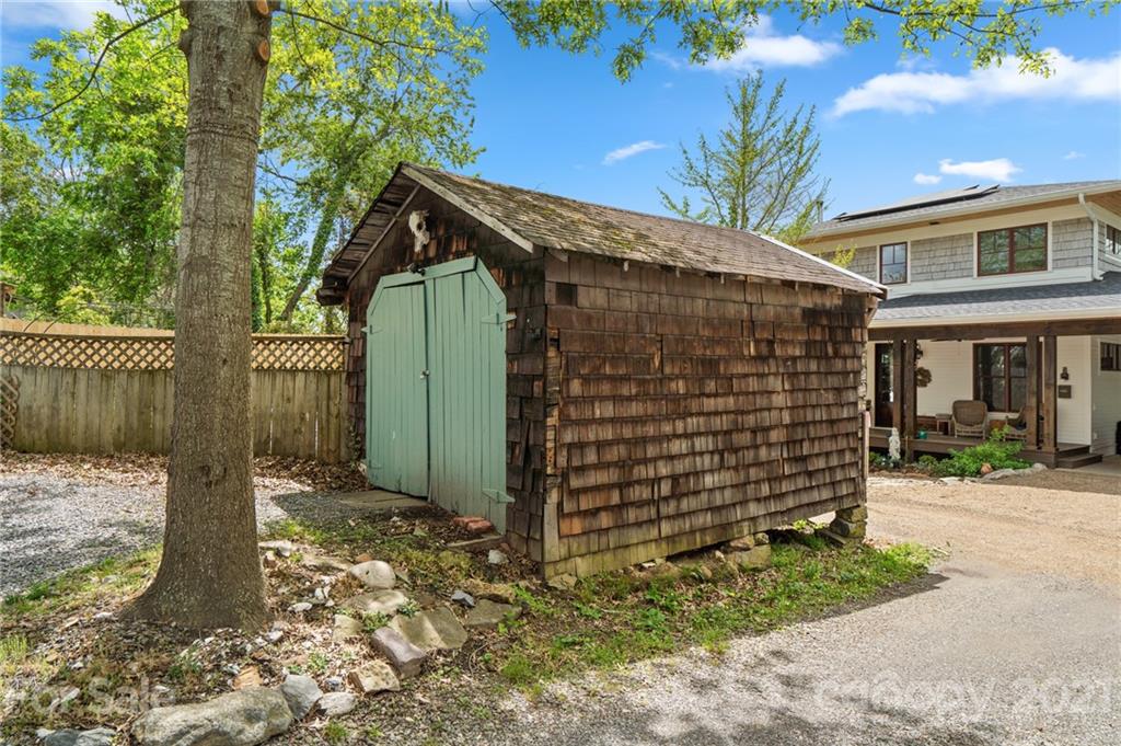 56 Pearson Drive Asheville, NC 28801 - Photo 39 of 44 a front view of a house with a tree
