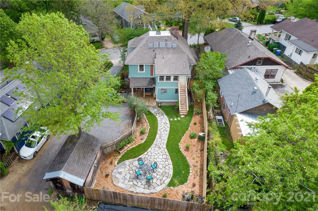 56 Pearson Drive Asheville, NC 28801 - Photo 40 of 44 an aerial view of a swimming pool patio and outdoor seating