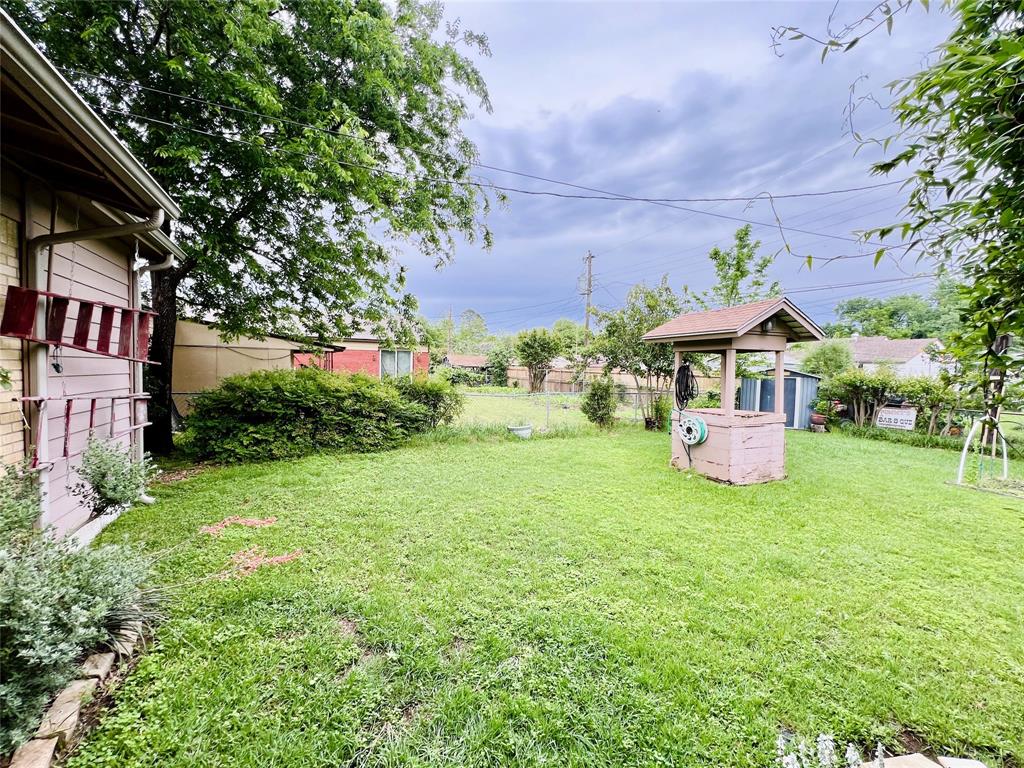 310 West 15th Street Irving, TX 75060 - Photo 27 of 30 a front view of a house with garden