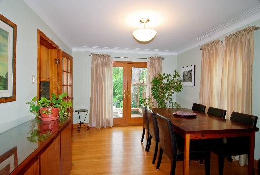 612 Selborne Road Riverside, IL 60546 - Photo 3 of 11 a view of a dining room with furniture window and wooden floor