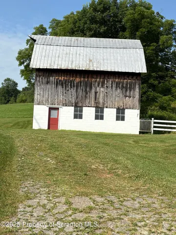 a view of a large body of water with a building in the background