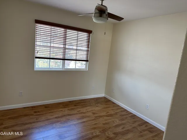 a view of a room that has a window in it